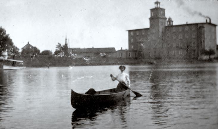 May Cornell on Mississippi with Hawthorne Mill in Background